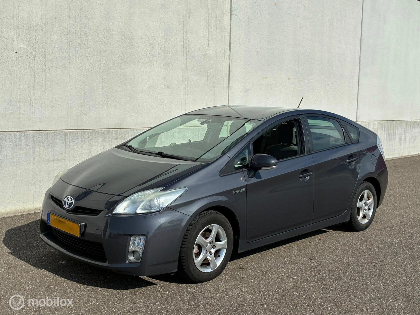 Toyota Prius 1.8 HSD Aspiration HYBRIDE AUTOMAAT NAP, Auto's, Gebruikt, 4 cilinders, Metaalkleur, 5 zetels