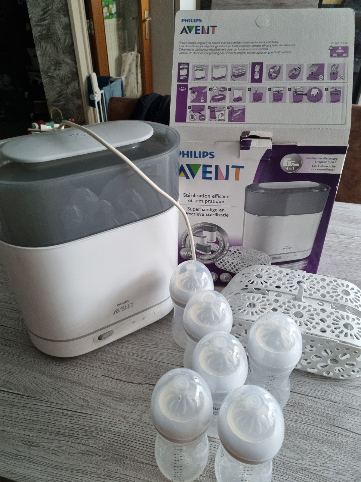 Elektrische stoomsterilisator met 6 avent flesjes, Ophalen