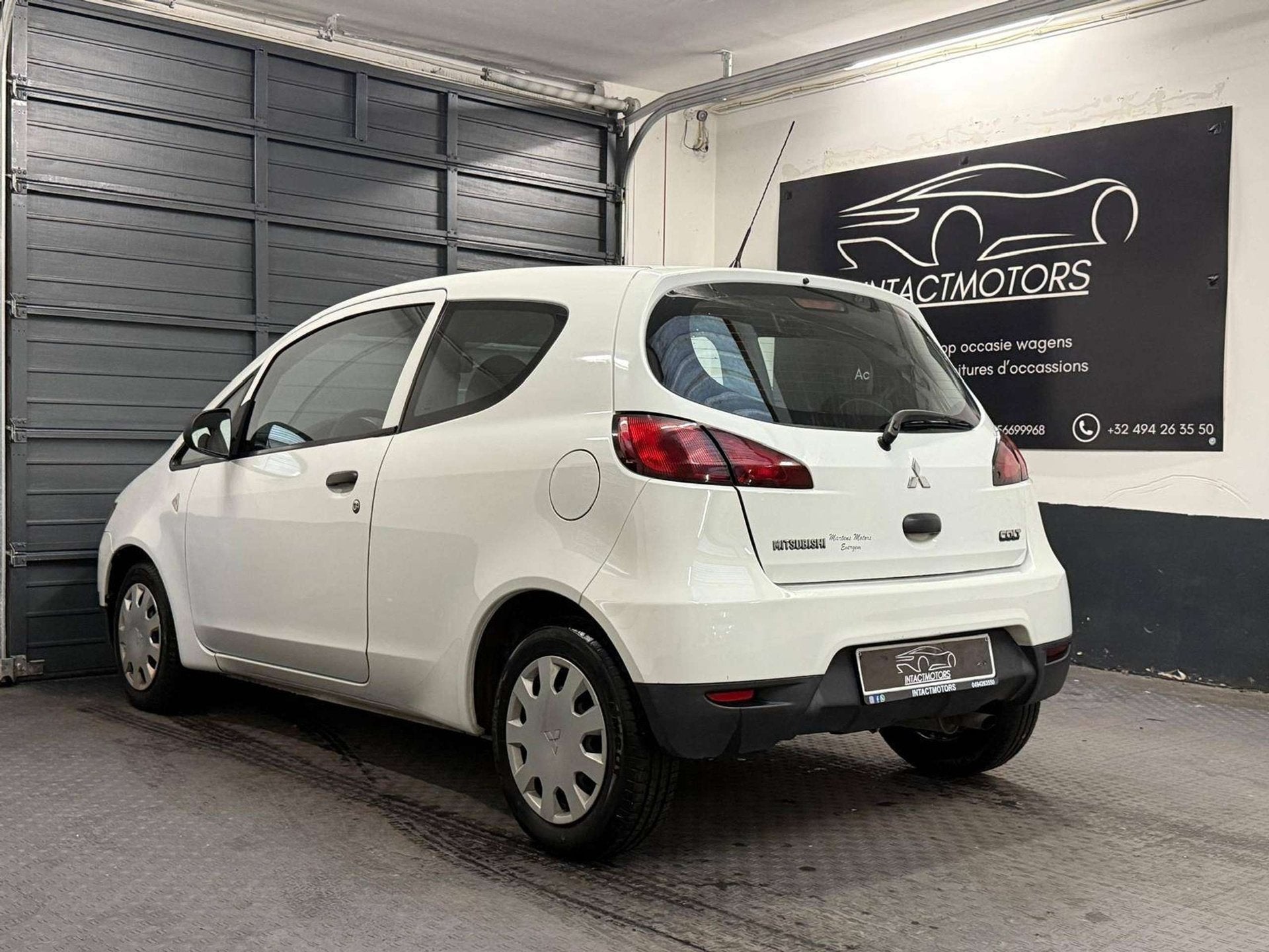 Mitsubishi Colt Colt 1.1i, Auto's, Zwart, Bedrijf, 130 g/km, 3 cilinders