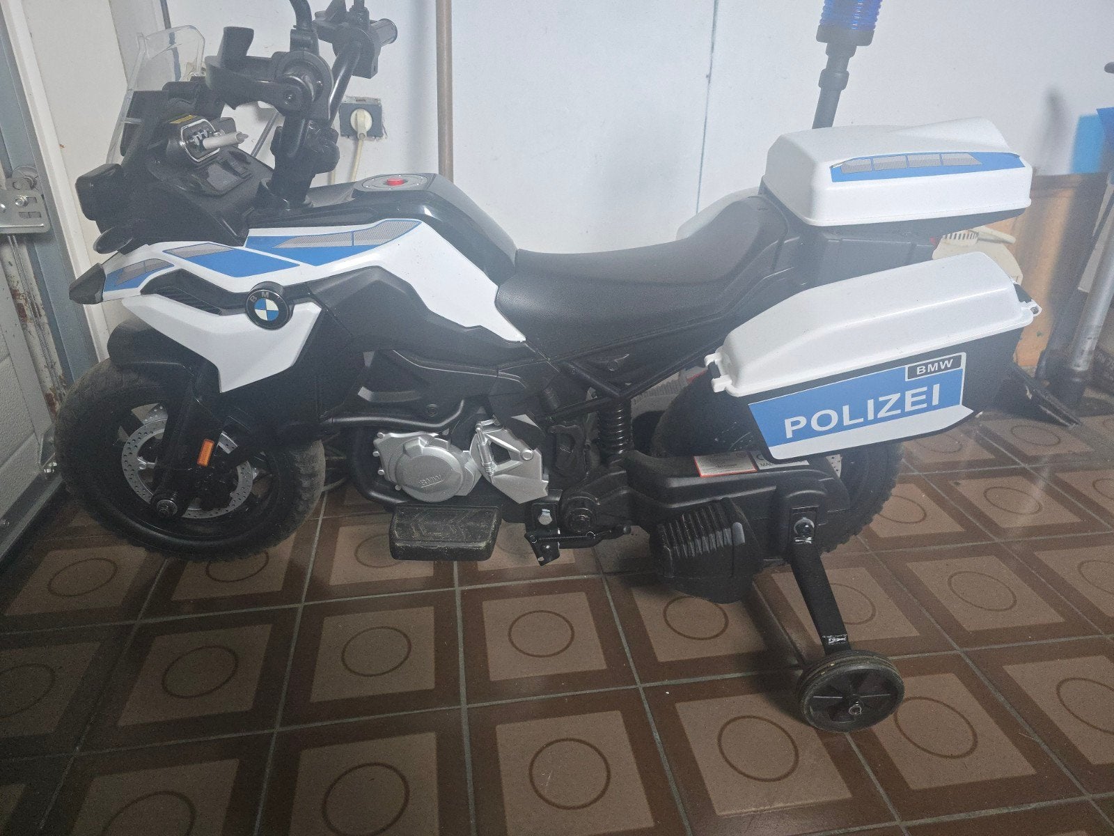 kinderbrommer politie BMW F850, Ophalen