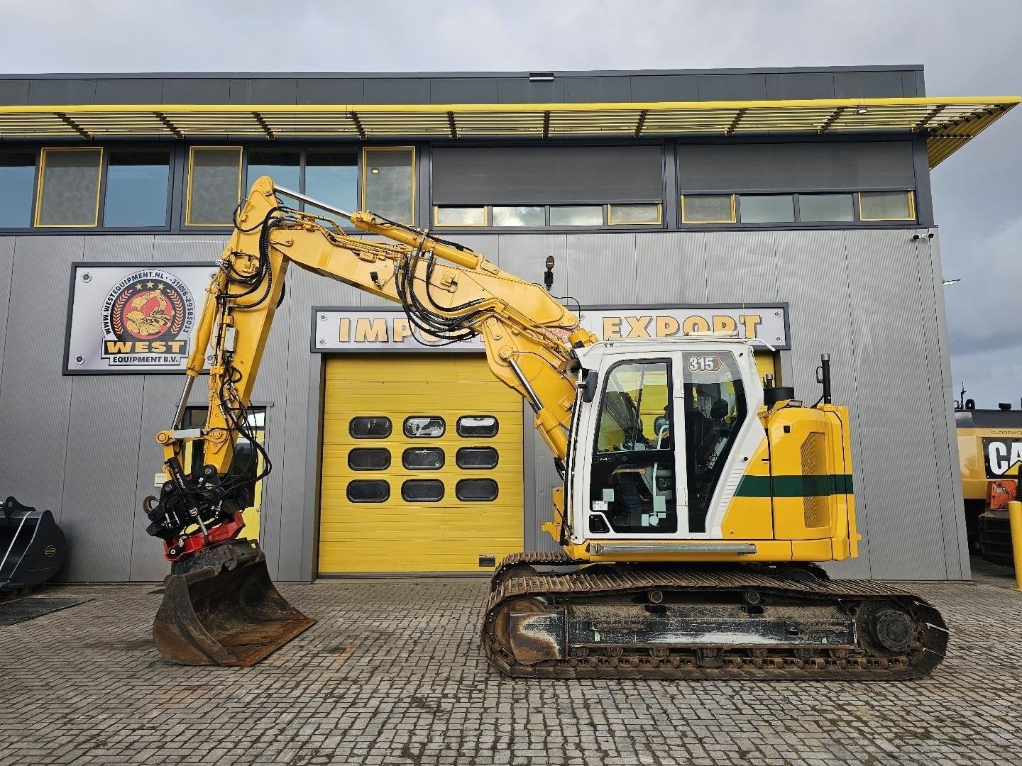 Caterpillar 315-07A WE1764, Zakelijke goederen, Machines en Bouw | Kranen en Graafmachines, Graafmachine