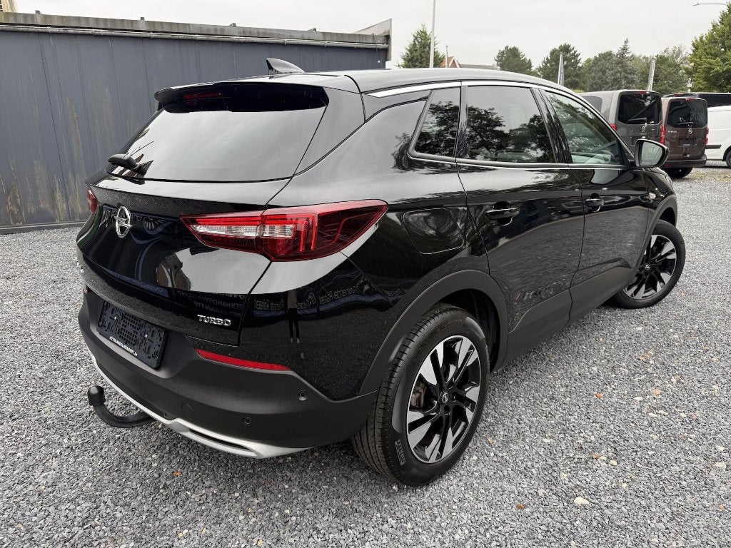 Opel Grandland X 1.2i Innovation X, Automaat, 77.000 km, Pan, Autos, Achat, Entreprise, Entretenue par le concessionnaire, Noir