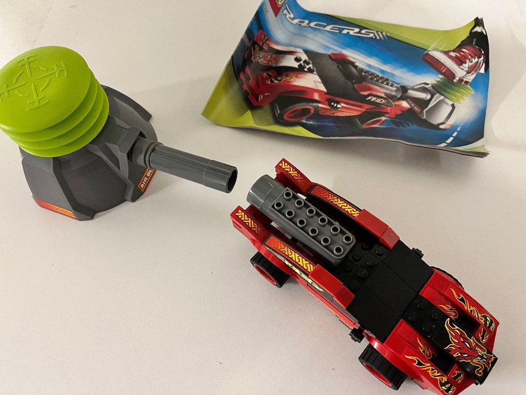 Lego 8227 rode auto dat men kan weg schieten - volledige set, Lego, Ophalen of Verzenden, Zo goed als nieuw, Compleet