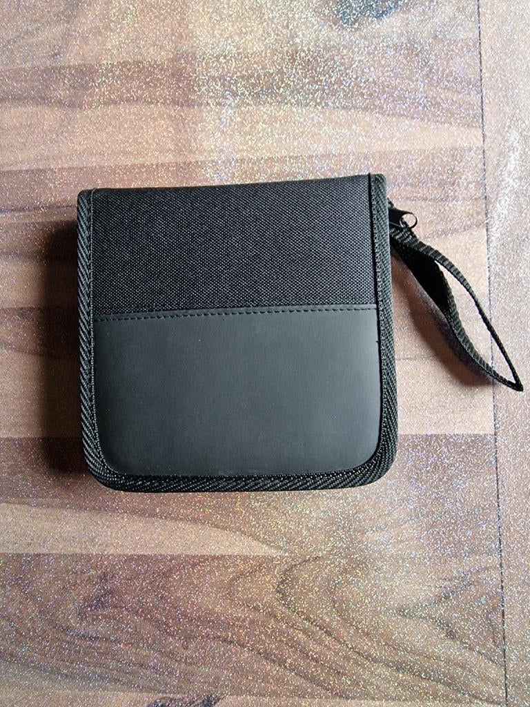 A vendre pochette rangement CD12 pièces noir(2pieces), Enlèvement, Comme neuf