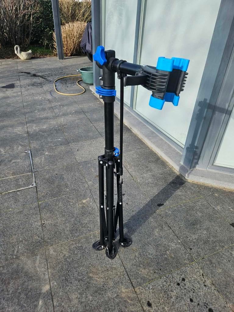 Staander om fietsen te poetsen, Ophalen