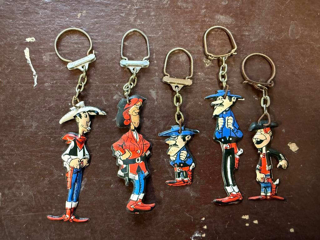 Vintage OMO sleutelhangers Lucky Luke Billy the Kid daltons, Enlèvement ou Envoi, Comme neuf