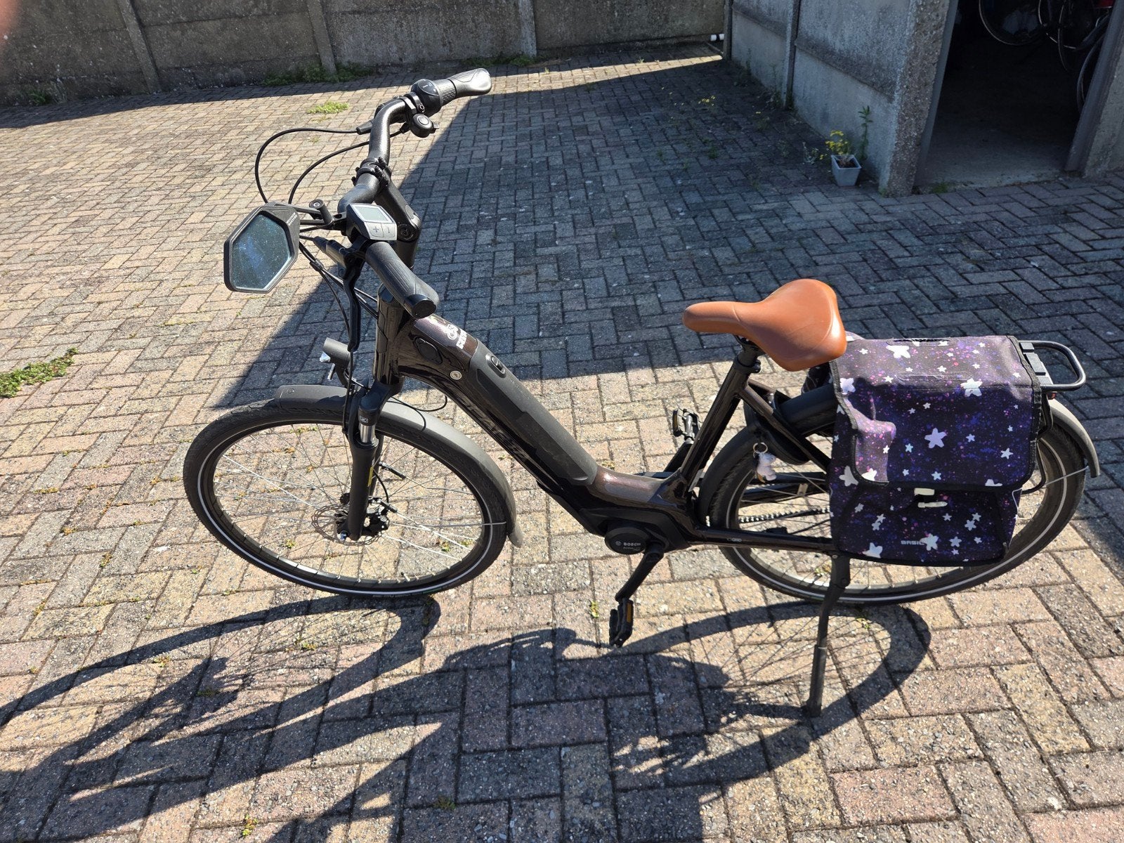 bijna nieuwe elektrische fiets met riemaandrijving, Ophalen