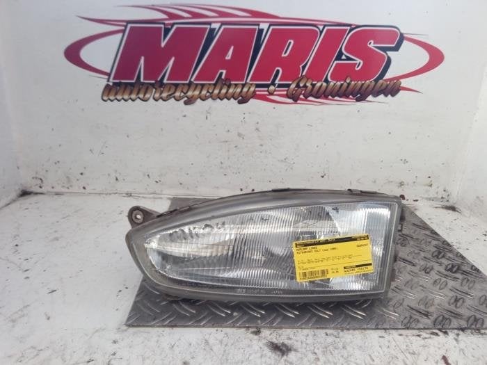 Koplamp links van een Mitsubishi Colt, Gebruikt, -, -, Mitsubishi