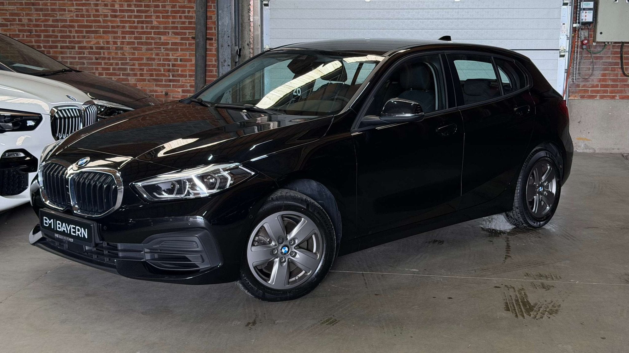BMW 116 iA Automaat Garantie Benzine EURO 6d, Automaat, Gebruikt, Zwart, Bedrijf
