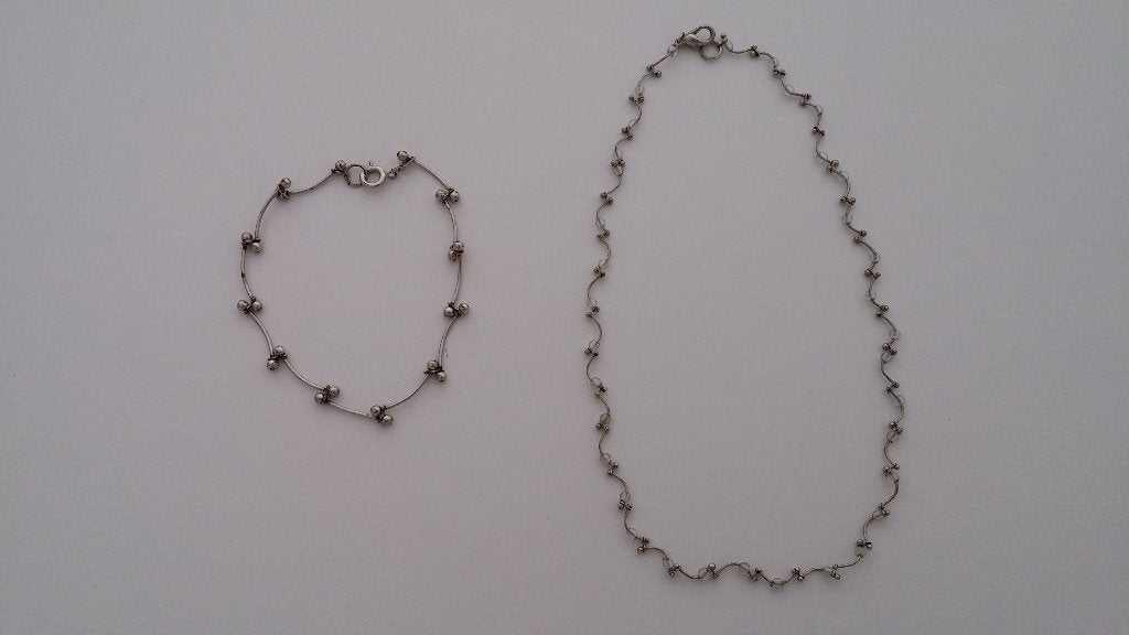 Ketting en bijpassende armband, Handtassen en Accessoires, Ophalen of Verzenden, Zo goed als nieuw, Zilver, Overige materialen
