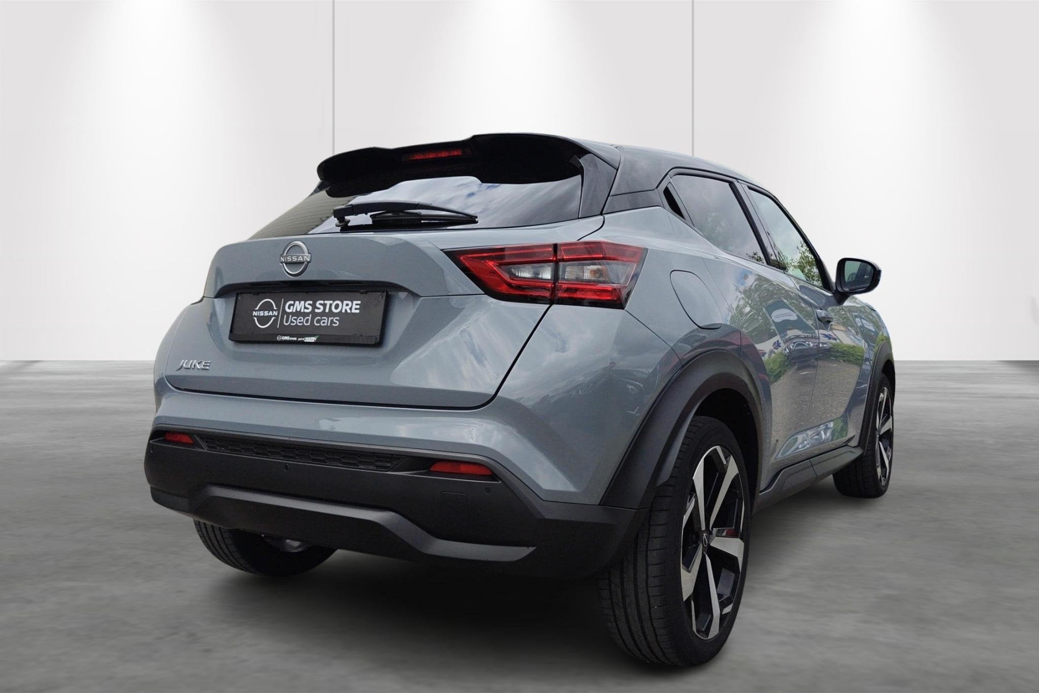 Nissan Juke 1.0 DIG-T 114 DCT Tekna + Cold Pack + Sound Pack, Stof, Zwart, 628 kg, 5 zetels