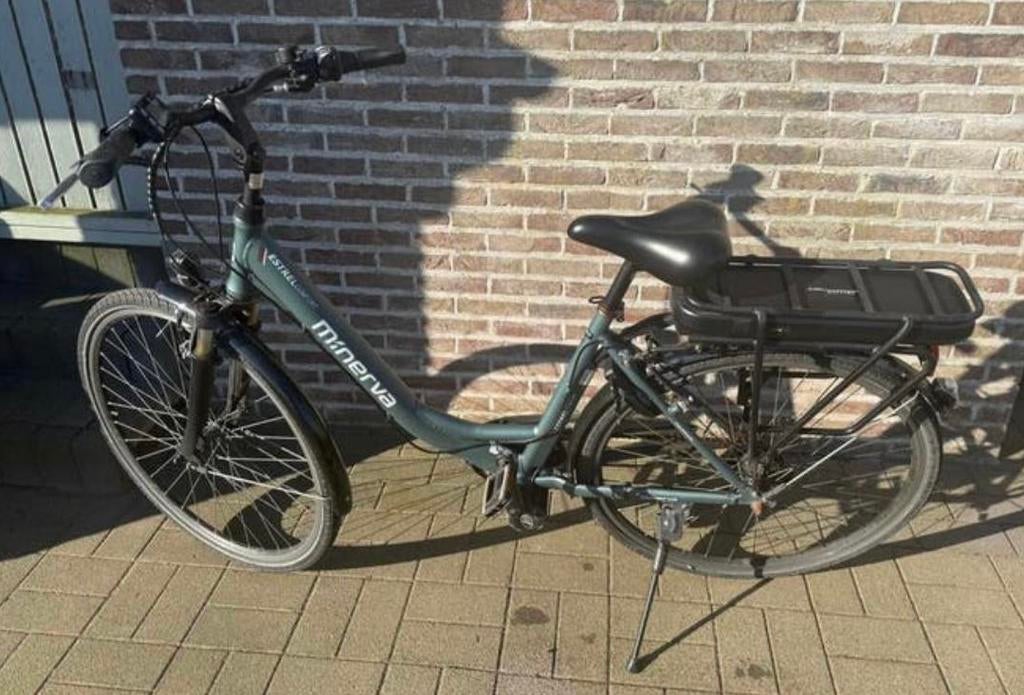 Elektrische fiets Minerva, Ophalen, Gebruikt, 30 tot 50 km per accu, Overige merken