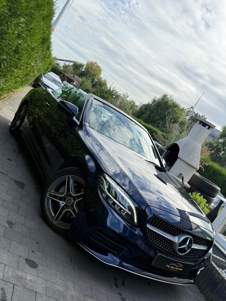 Mercedes-benz C200 Cabrio facelift AMG, Auto's, Dealer onderhouden, 4 cilinders, Cabriolet, Blauw
