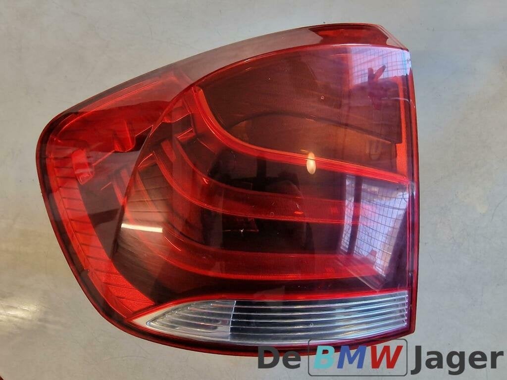 Achterlicht linksbuiten BMW X1 E84 63212990109, Gebruikt, Ophalen of Verzenden, BMW