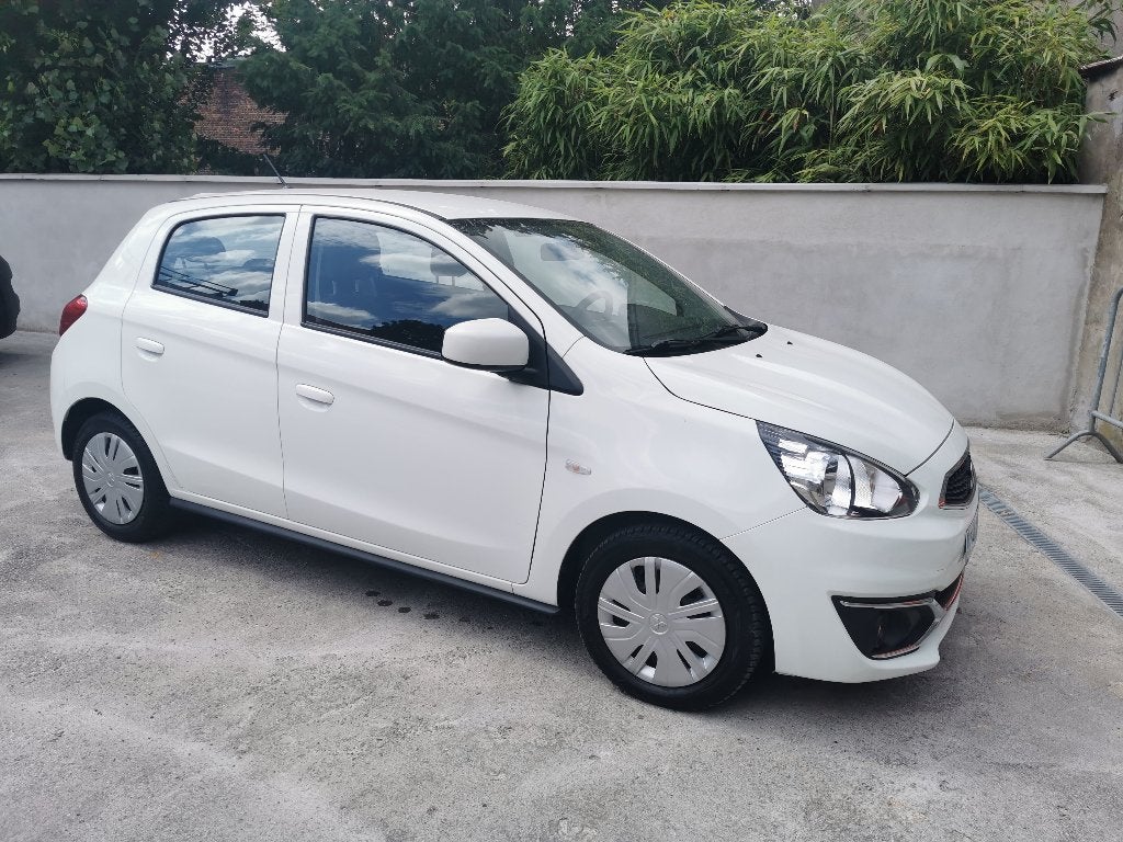 Mitsubishi Space Star 1.0i AIRCO 57.000 km + garantie, Auto's, Voorwielaandrijving, Stof, 920 kg, Wit