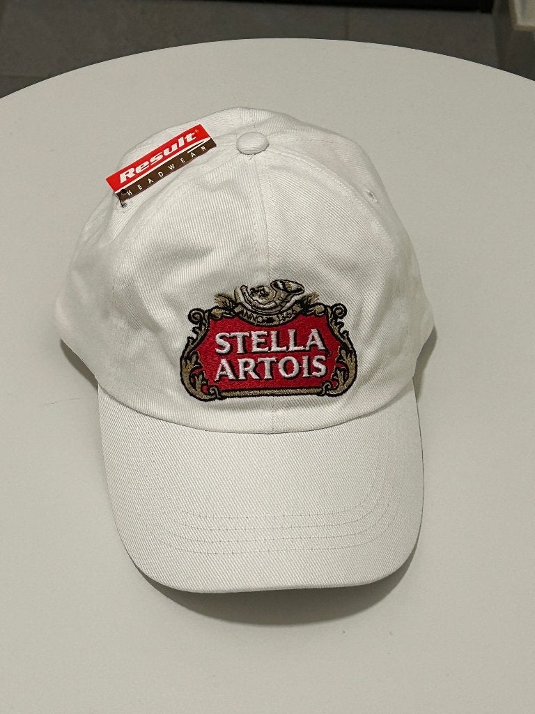 Stella Artois Pet in het Wit, Verzamelen, Ophalen of Verzenden, Nieuw, Kleding, Stella Artois