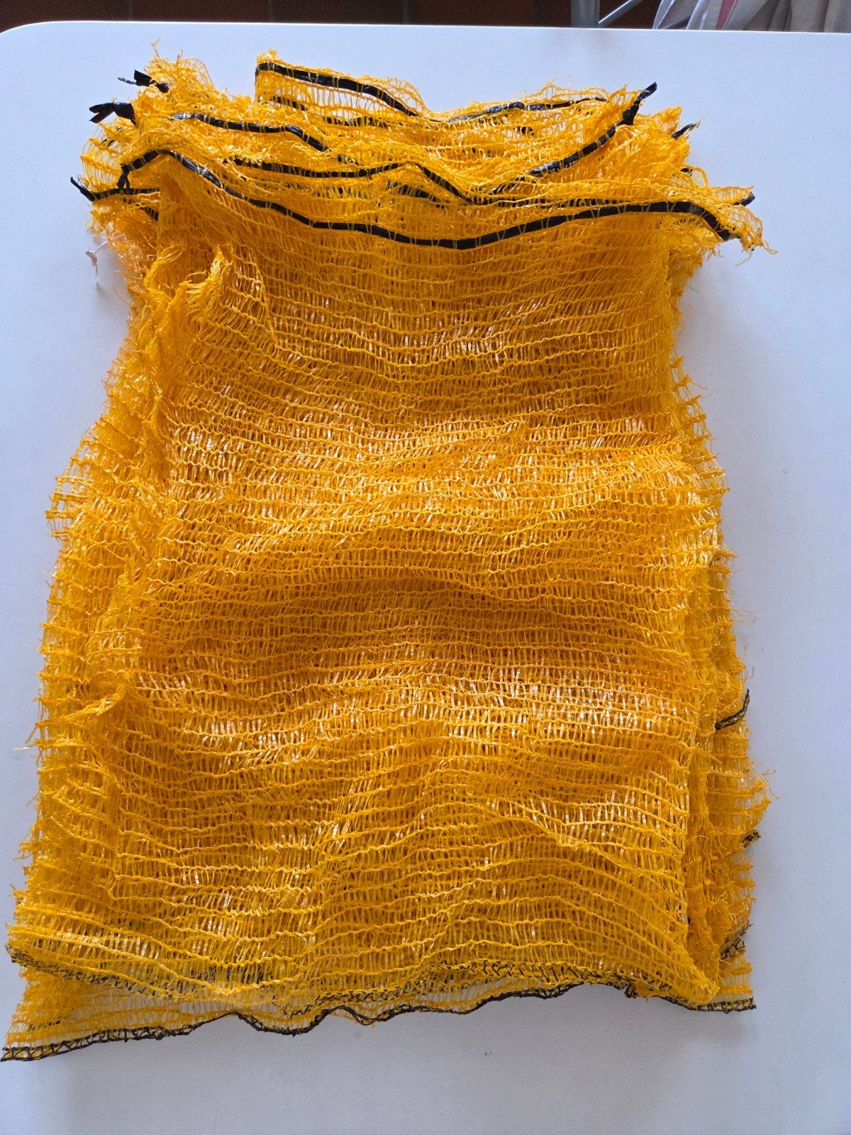 10 gele plastieken netzakken 10kg, Ophalen of Verzenden, Nieuw