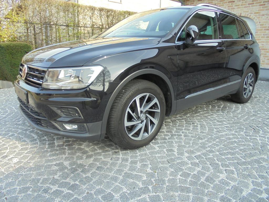 Volkswagen Tiguan 1.4 TSI 125pk SOUND / NAVI/ PDC/ CC/, Auto's, Volkswagen, 0 kg, 4 cilinders, https://public.car-pass.be/vhr/4fb53aa3-ffe2-4eb5-8519-a0baa4d288f3