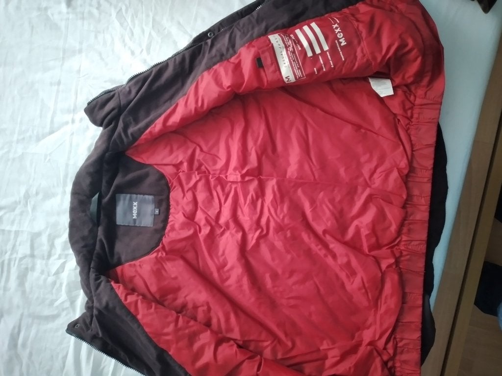 veste sans manche, Ophalen, Zo goed als nieuw