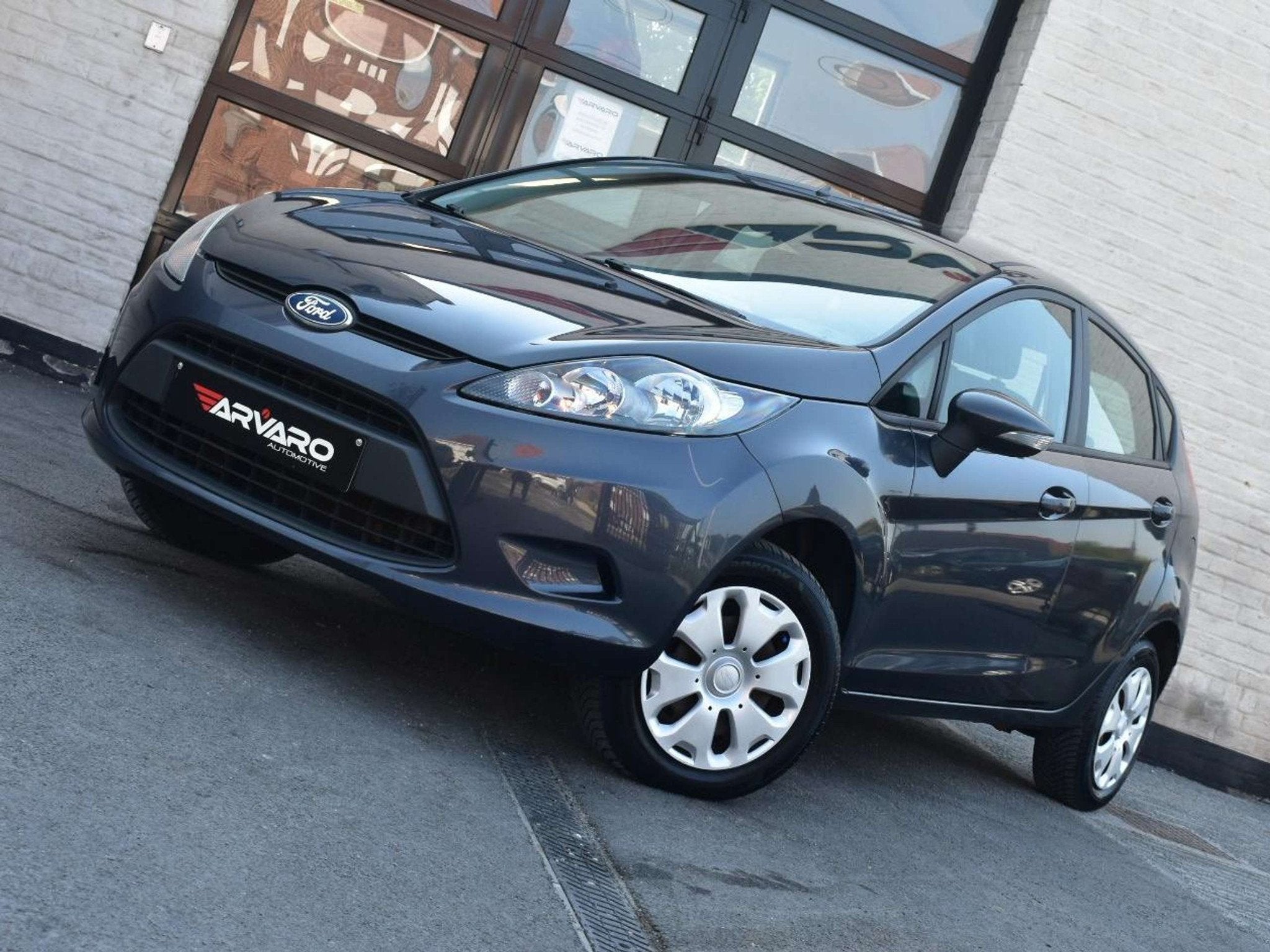 Ford Fiesta 1.25i Titanium / Verw Zetels / Airco / Topstaat, Auto's, Voorwielaandrijving, Euro 5, Stof, Gebruikt
