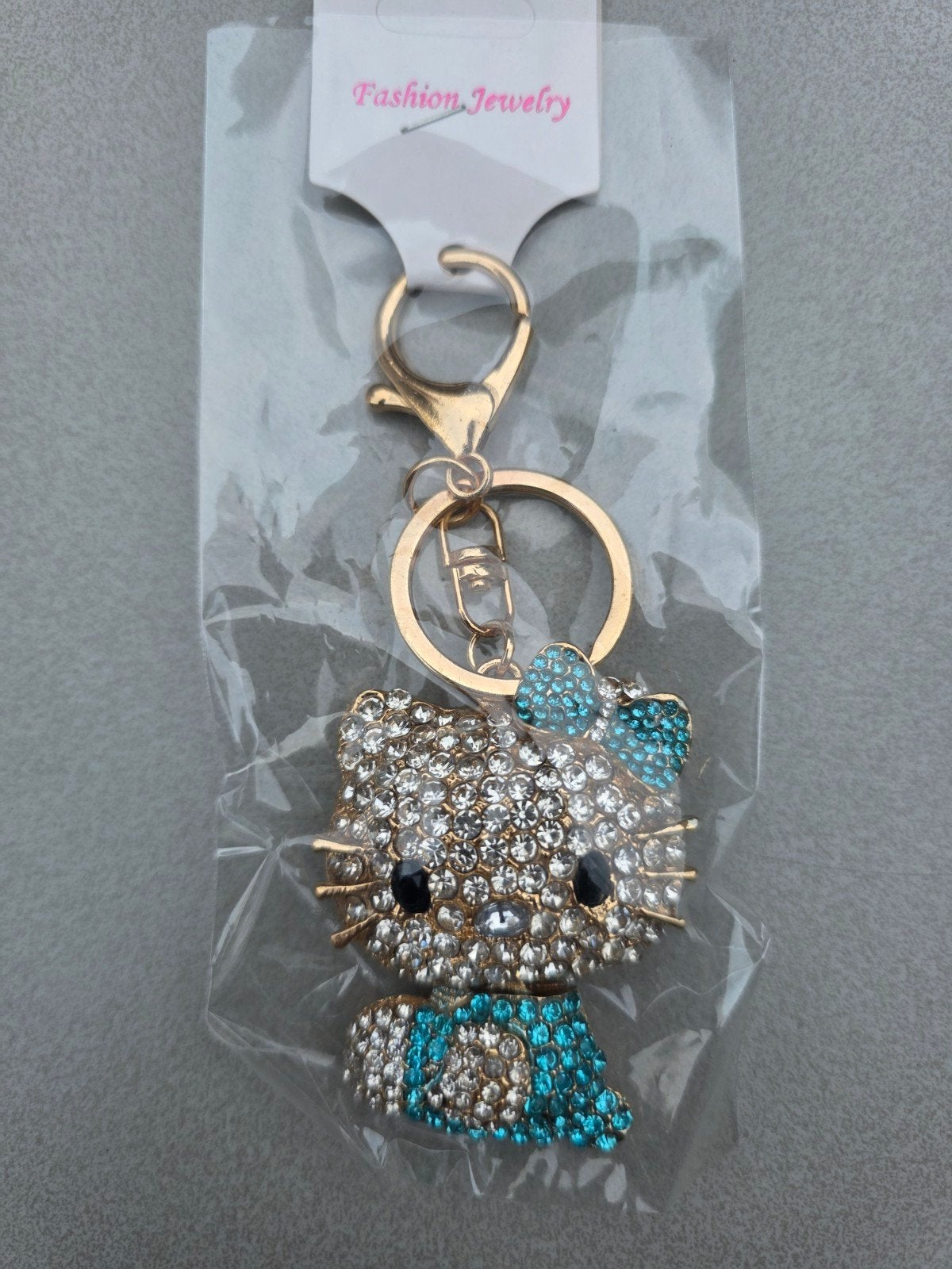Hello Kitty sleutelhanger licht blauw met strass, Ophalen of Verzenden, Nieuw, Knuffel of Figuurtje