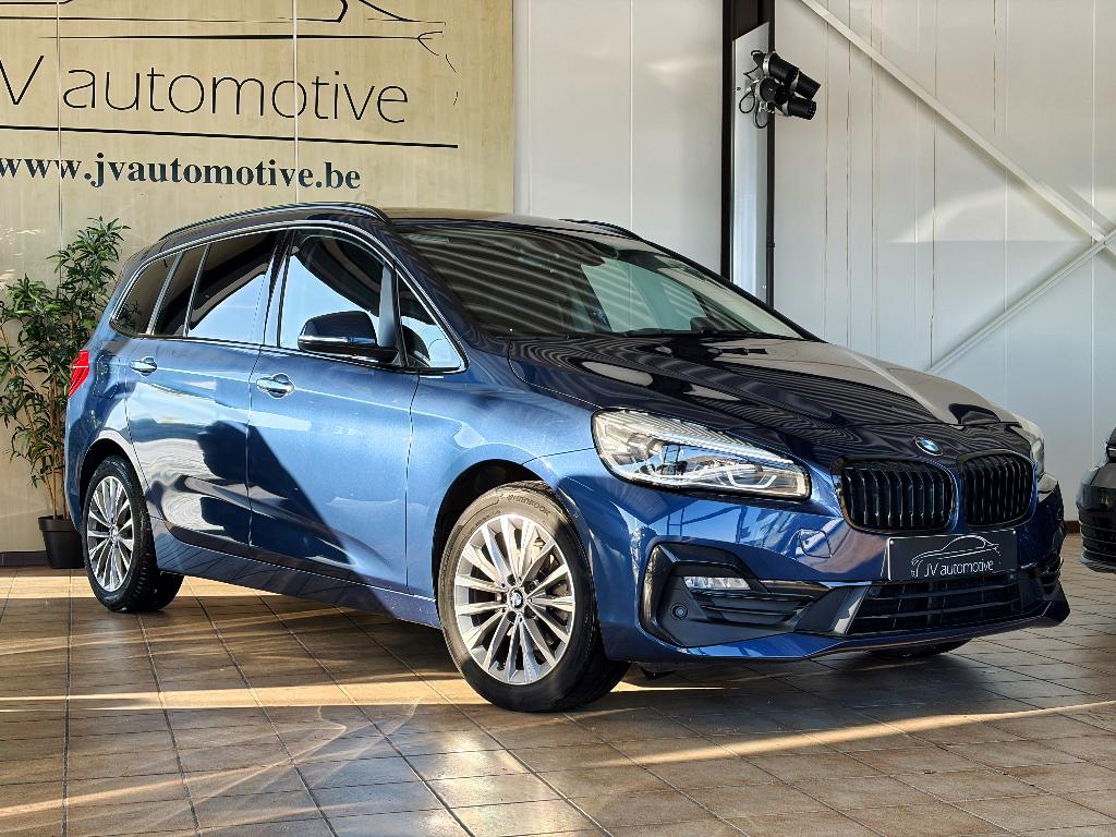 BMW 216i Gran Tourer - 2021 - 99.381km - Leder - Camera, Auto's, BMW, Voorwielaandrijving, Blauw, Leder, 3 cilinders