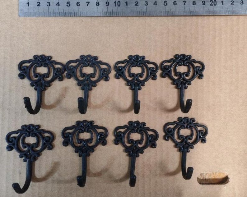 Set van 8 vintage kapstokhaken, Ophalen