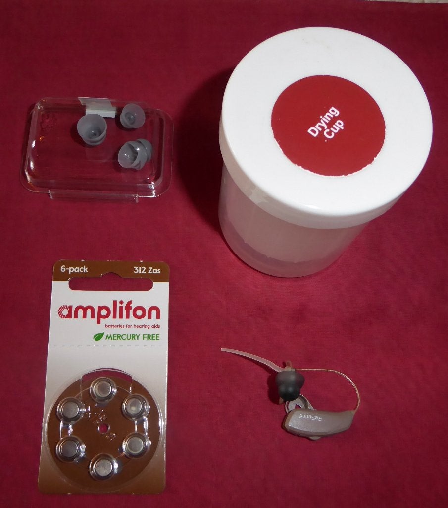 Support pour appareils auditifs pour « Amplifon », Enlèvement, Utilisé
