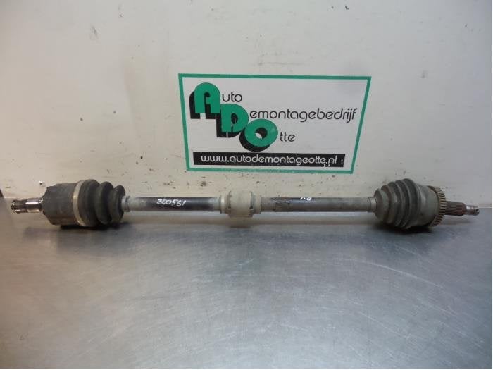 Arbre de transmission avant droit d'un Kia Sportage (Sportag, Kia, -, 3 mois de garantie, Utilisé