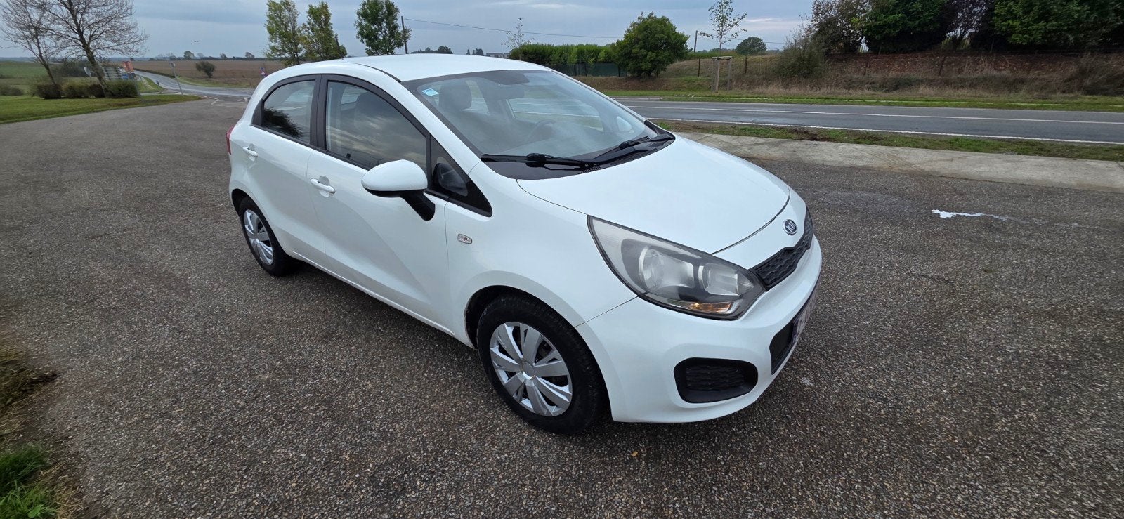 kia rio 1200 diesel, Auto's, Wit, Adaptive Cruise Control, Particulier, Rio