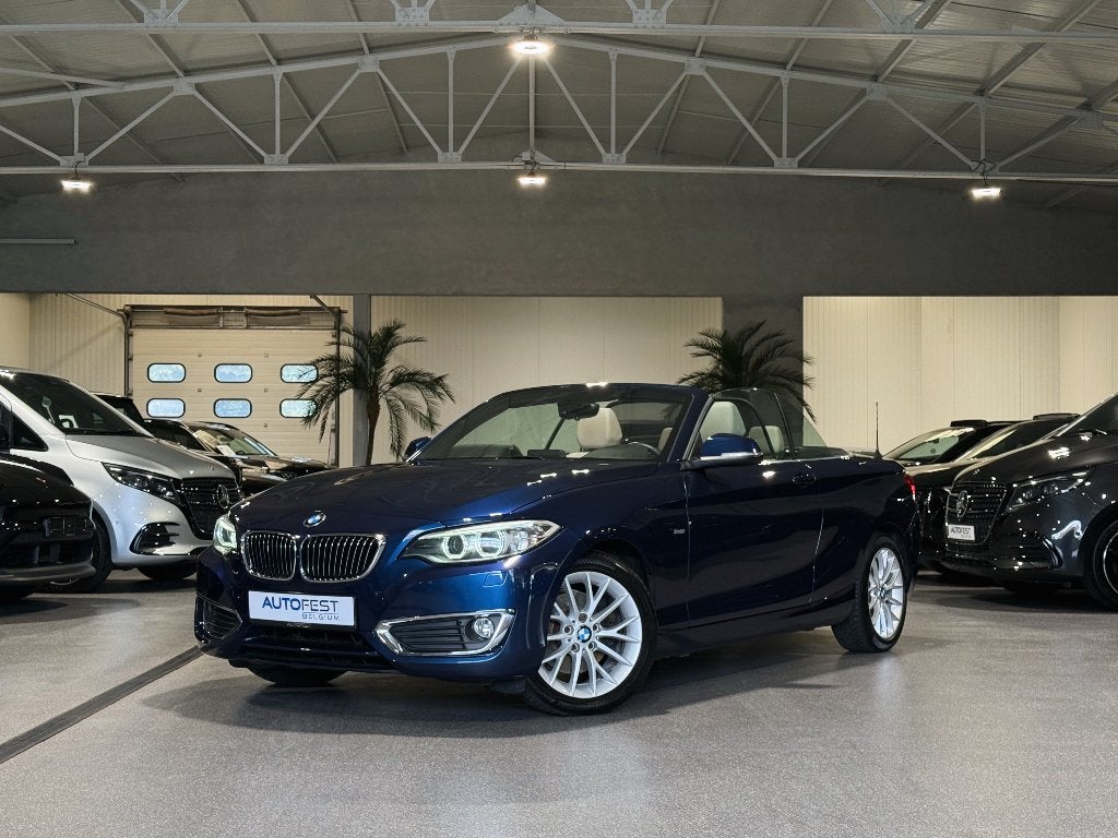 BMW 220i Cabriolet ‘Luxury Line’ - Garantie, Achterwielaandrijving, Blauw, Bedrijf, Handgeschakeld