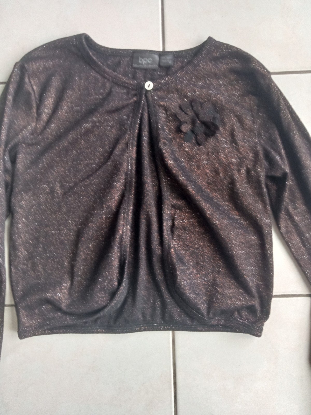 bruine glitter gillet, Ophalen