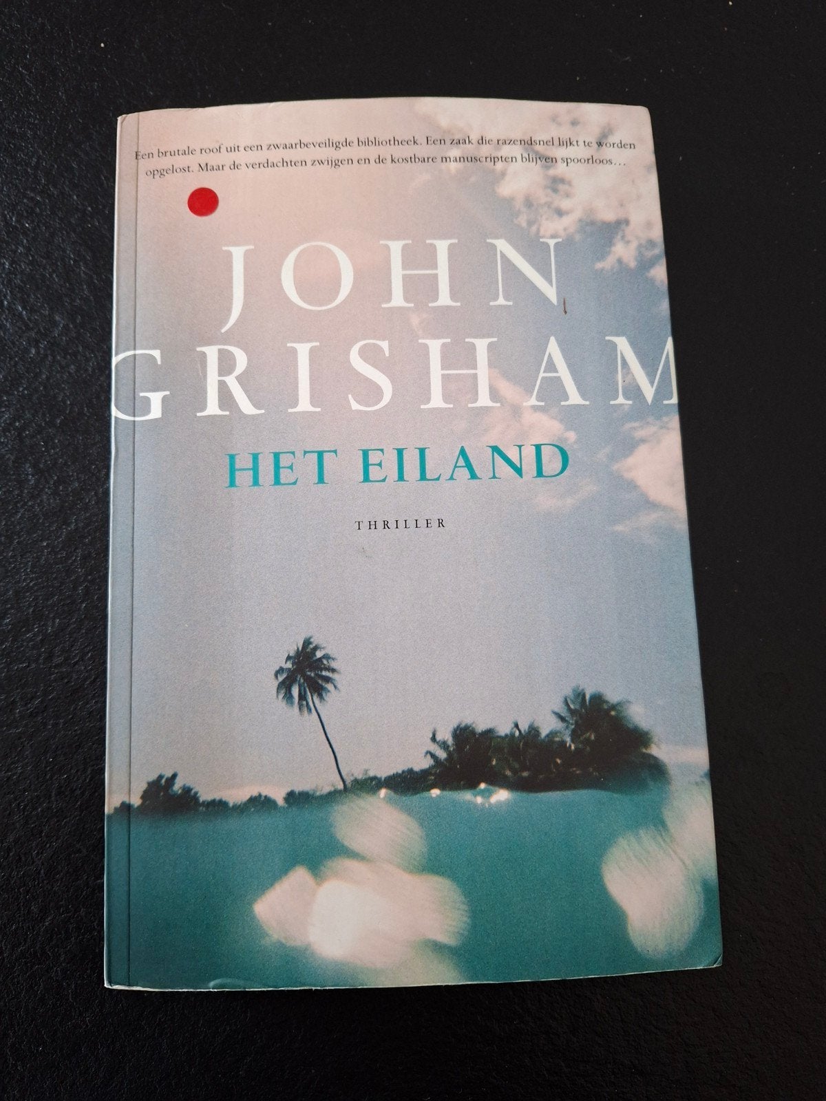 Het eiland John Grisham, Ophalen