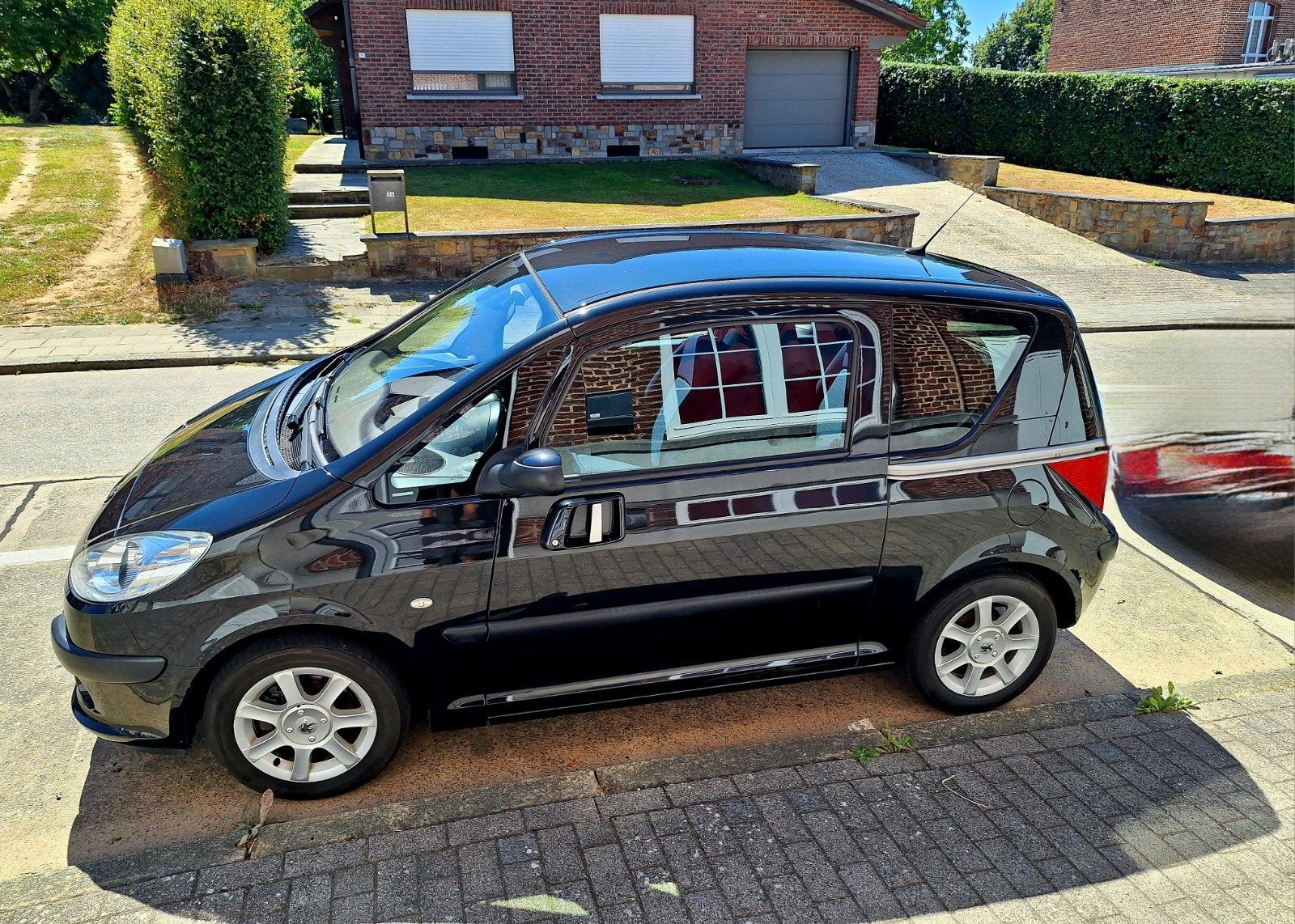 Superbe Peugeot 1007 en très bon état !, Auto's, 4 zetels, Monovolume, 1350 kg, Zwart