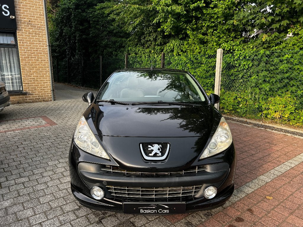 PEUGEOT 207CC 1.6/ROLAND GARROS/95.000KM/12M GARANTIE, Auto's, Zwart, Cabriolet, Zwart, Leder
