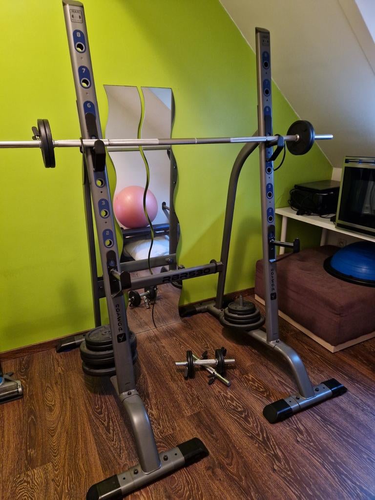 Squat rack met gewichten, Ophalen
