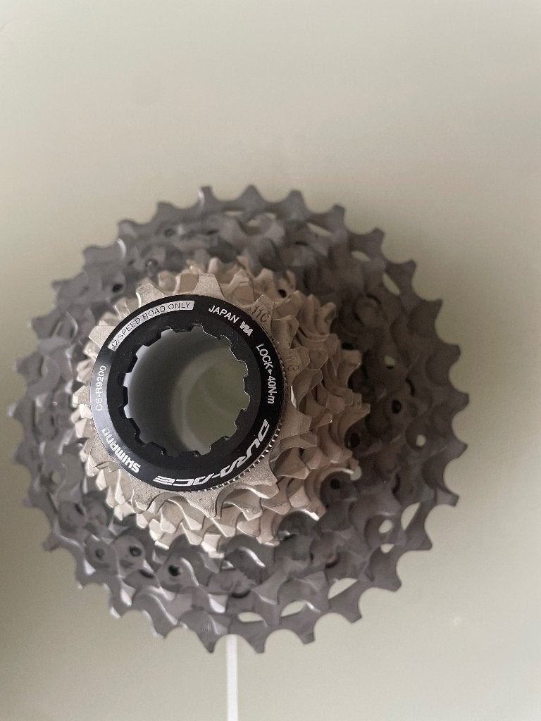 Cassette 12 vitesses Dura Ace 9200 11/30, Vélos & Vélomoteurs, Comme neuf, Shimano, Racefiets, Titane