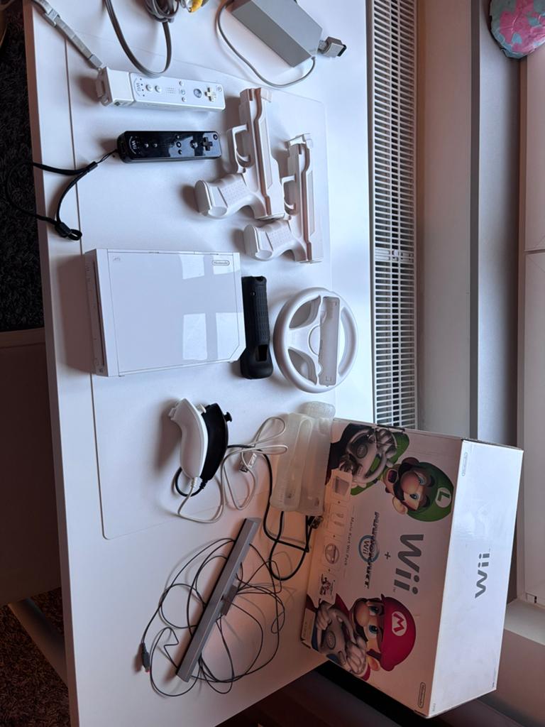 Nintendo WII met spelletjes en accessoires, Games en Spelcomputers, Spelcomputers | Nintendo Wii, Ophalen of Verzenden, Gebruikt