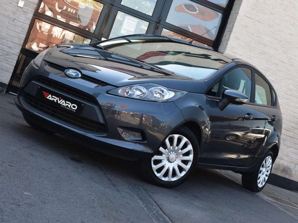 Ford Fiesta 1.25i Titanium / Topstaat / Airco / 1e Eig / Gar, Voorwielaandrijving, Euro 5, Stof, Gebruikt