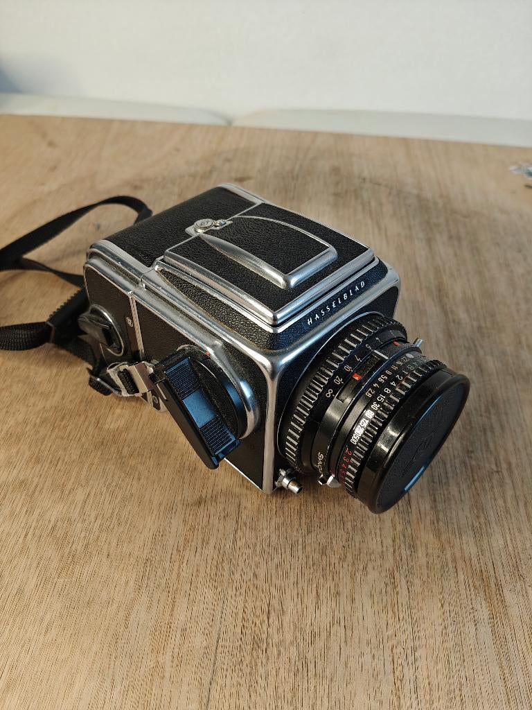 Hasselblad 500 c/m met Carl Zeiss planar lens, Enlèvement, Utilisé, Reflex miroir, Autres Marques