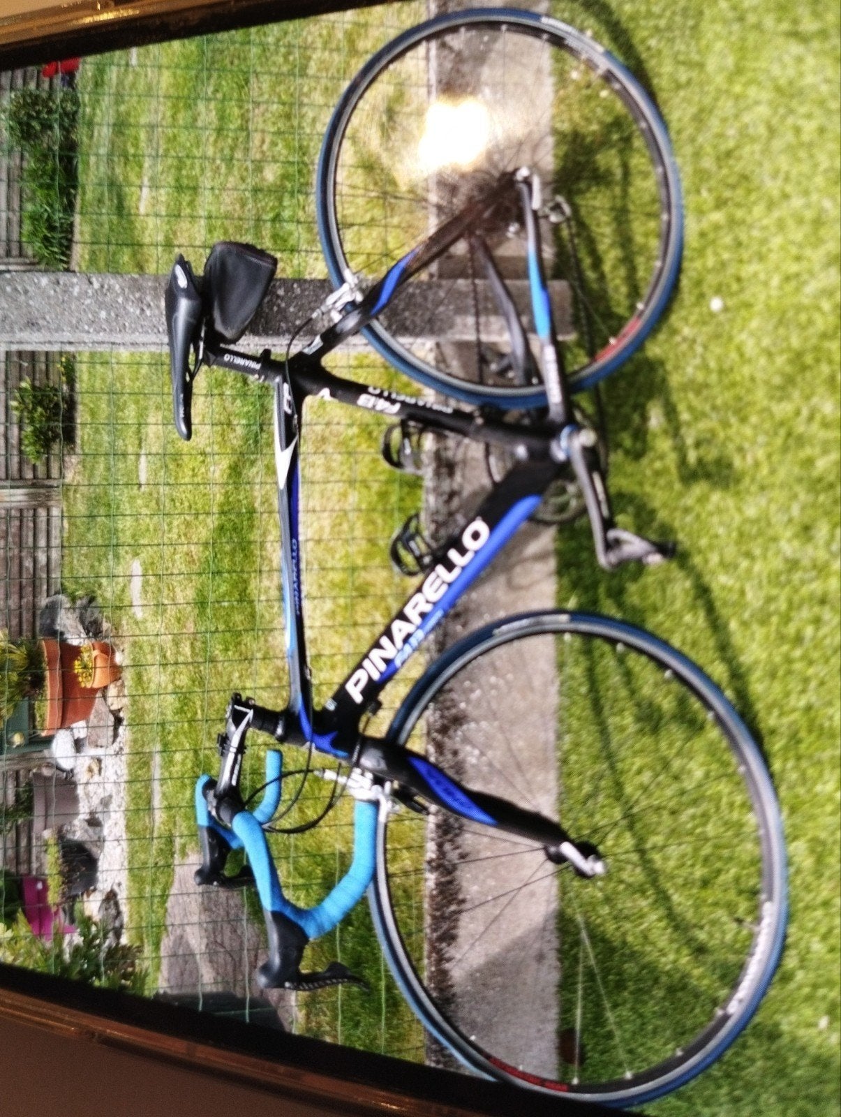 een koers fiets met ongeveer 10 versnelling merk pinarello k, Ophalen