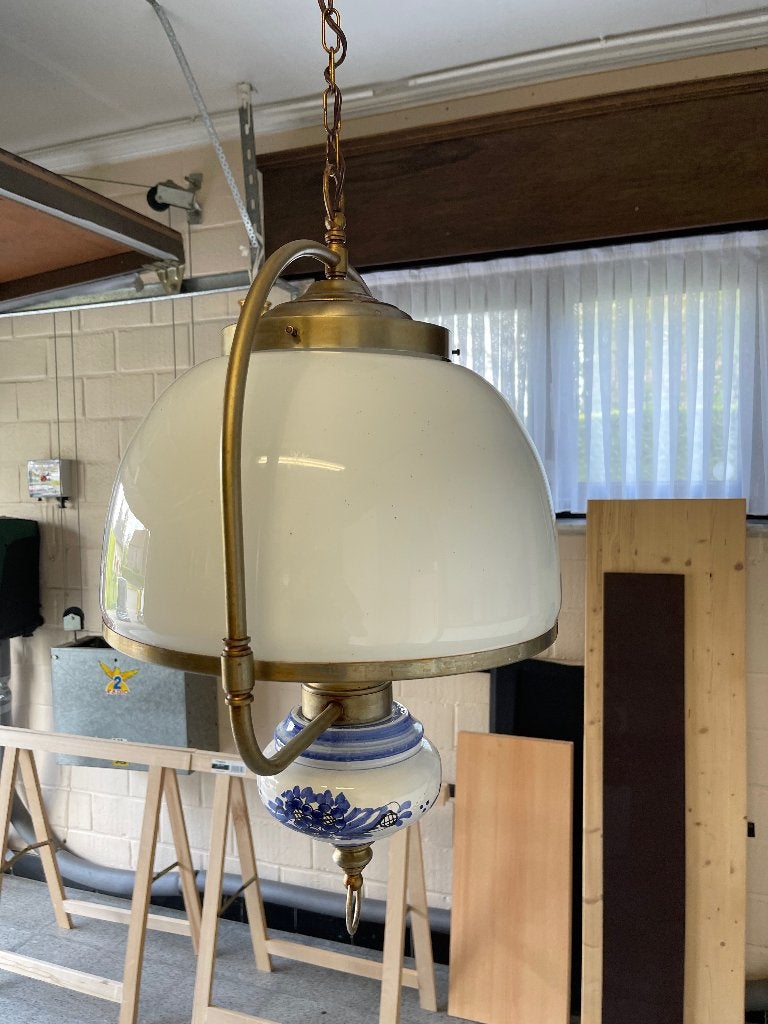 Oude luchter in Delfts' porselein, Ophalen