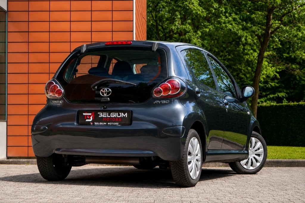Toyota Aygo 1.0i Cool - Klimaatregeling - Navigatie - Radio, Voorwielaandrijving, Stof, 50 kW, Bedrijf