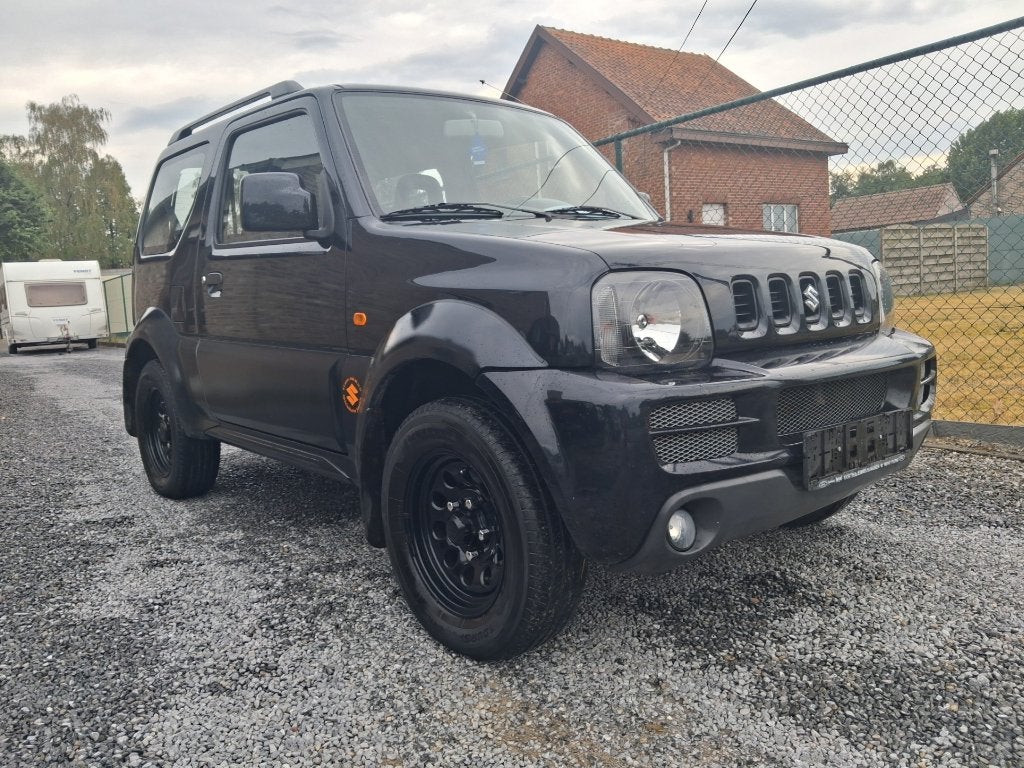 suzuki jimny #4x4# 1300cc benzine !!77 000km!! bj 2007, Auto's, 4 zetels, Stof, Zwart, Zwart