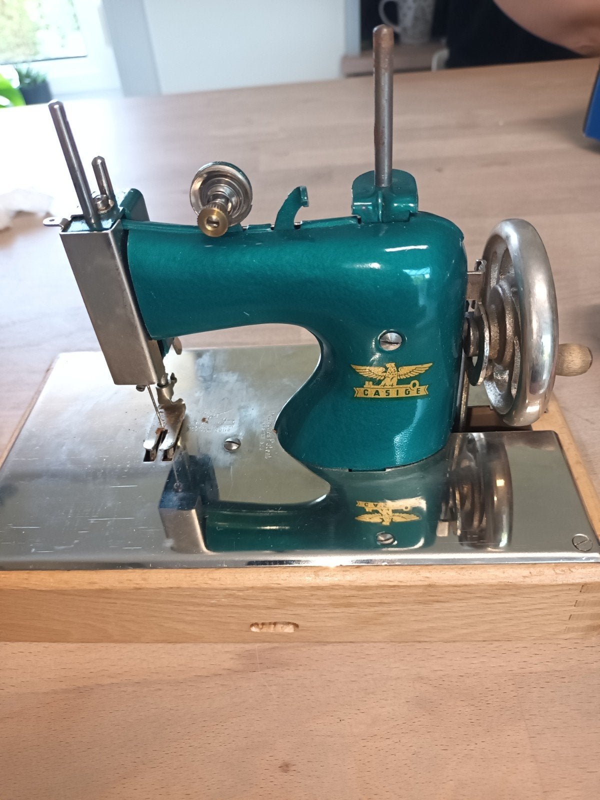 Naaimachientje speelgoed, Ophalen