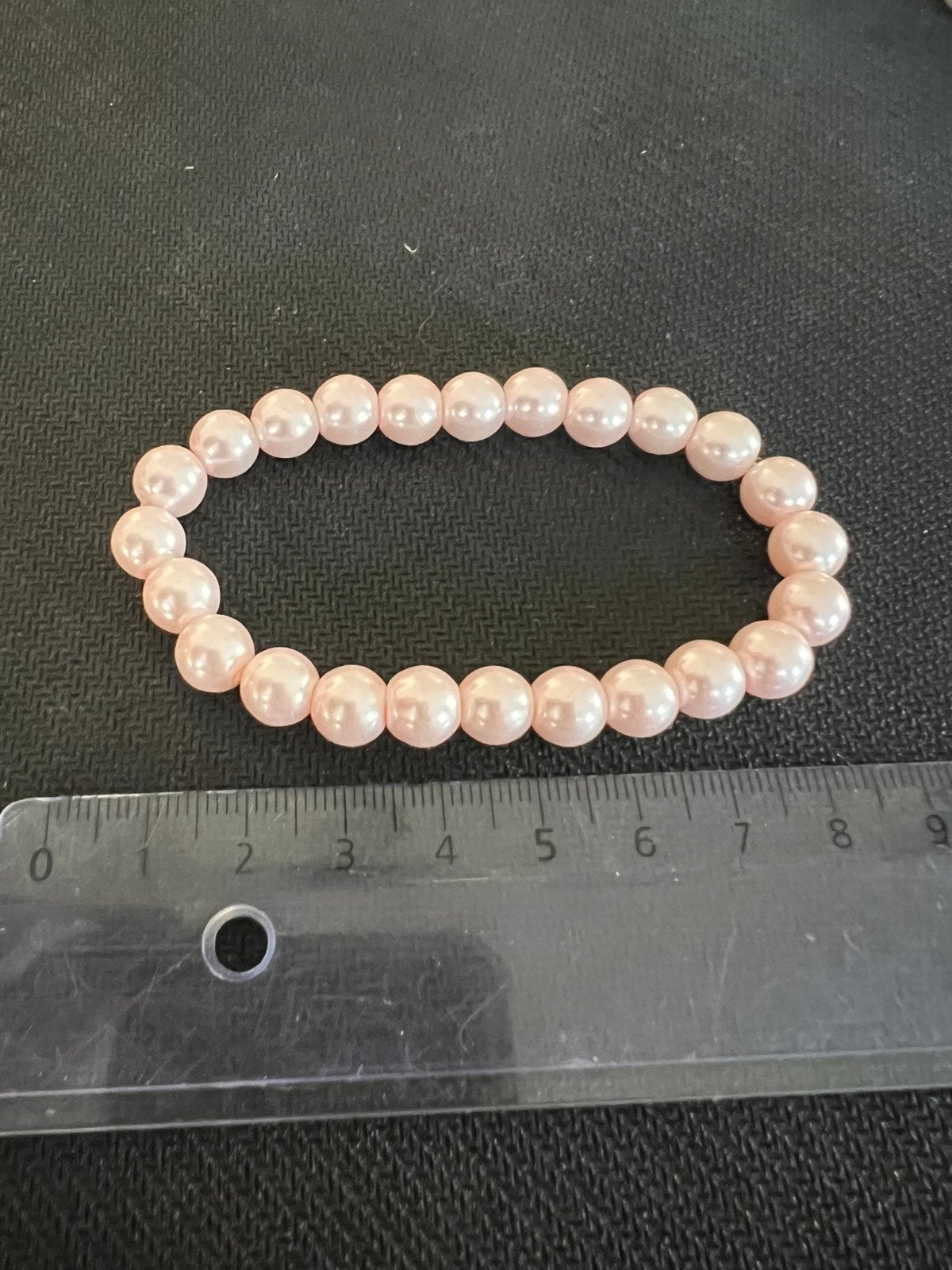 Parel armband, Ophalen of Verzenden, Zo goed als nieuw, Roze