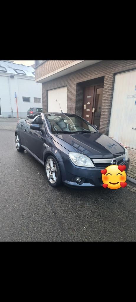 Opel tigra 1.4 benzine euro4 eerste eigenaar, Auto's, Voorwielaandrijving, Elektrische ramen, Cabriolet, Leder en Stof