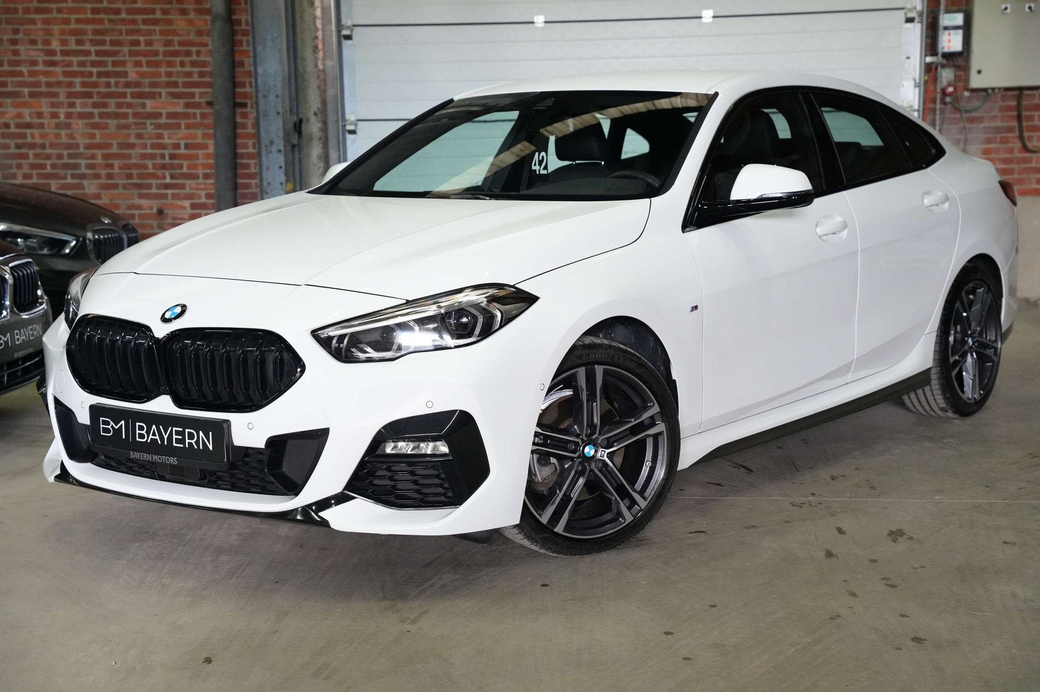 BMW 218 iA Gran Coupe Automaat M Sportpakket Garantie Benz, Automaat, Gebruikt, 1905 kg, Wit