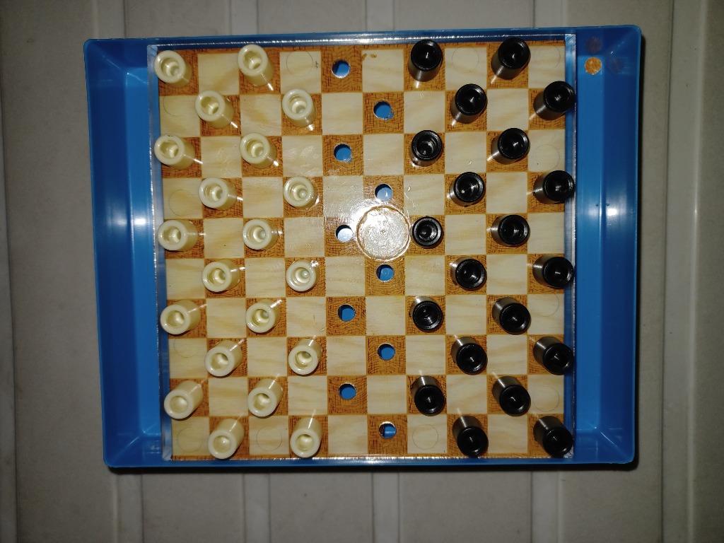 Jeu de dames de voyage, Enlèvement, Utilisé
