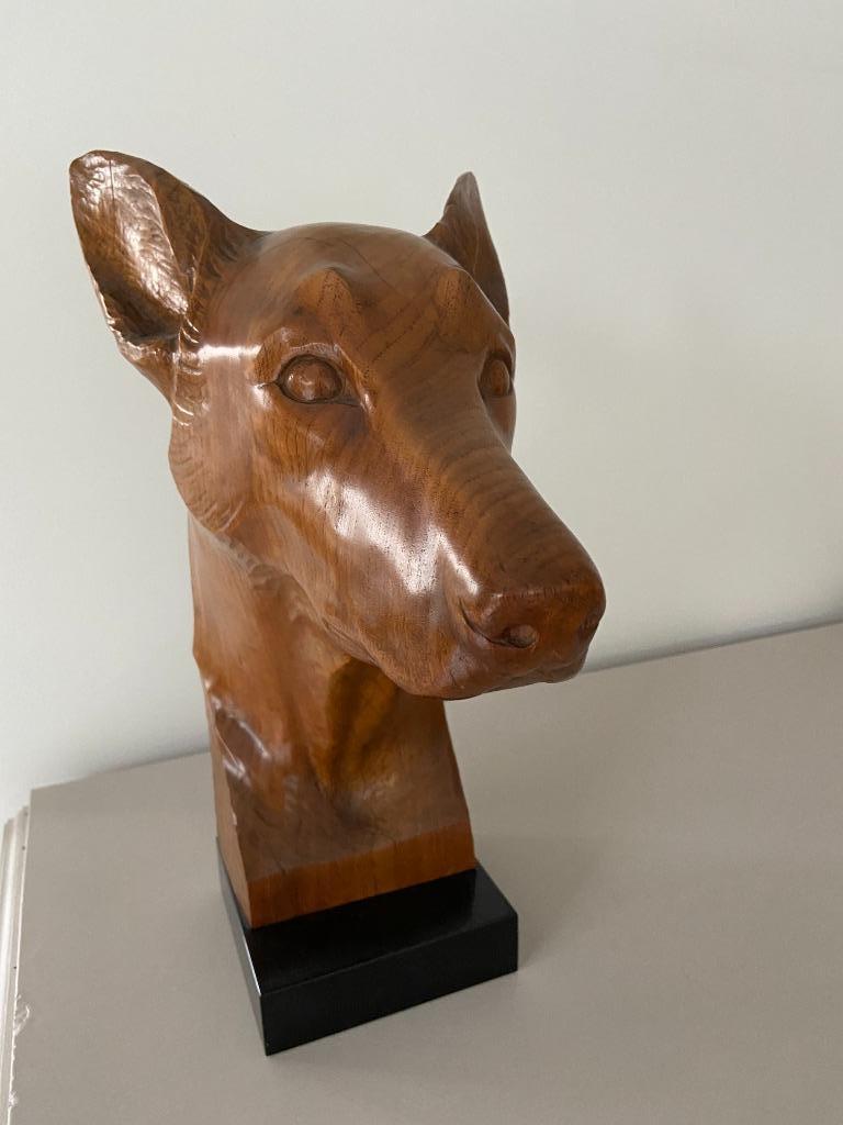 Sculpture en bois - tête de chien, Enlèvement